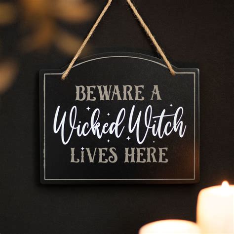Exploring the Wicked Witch Lives Here Sign Phenomenon